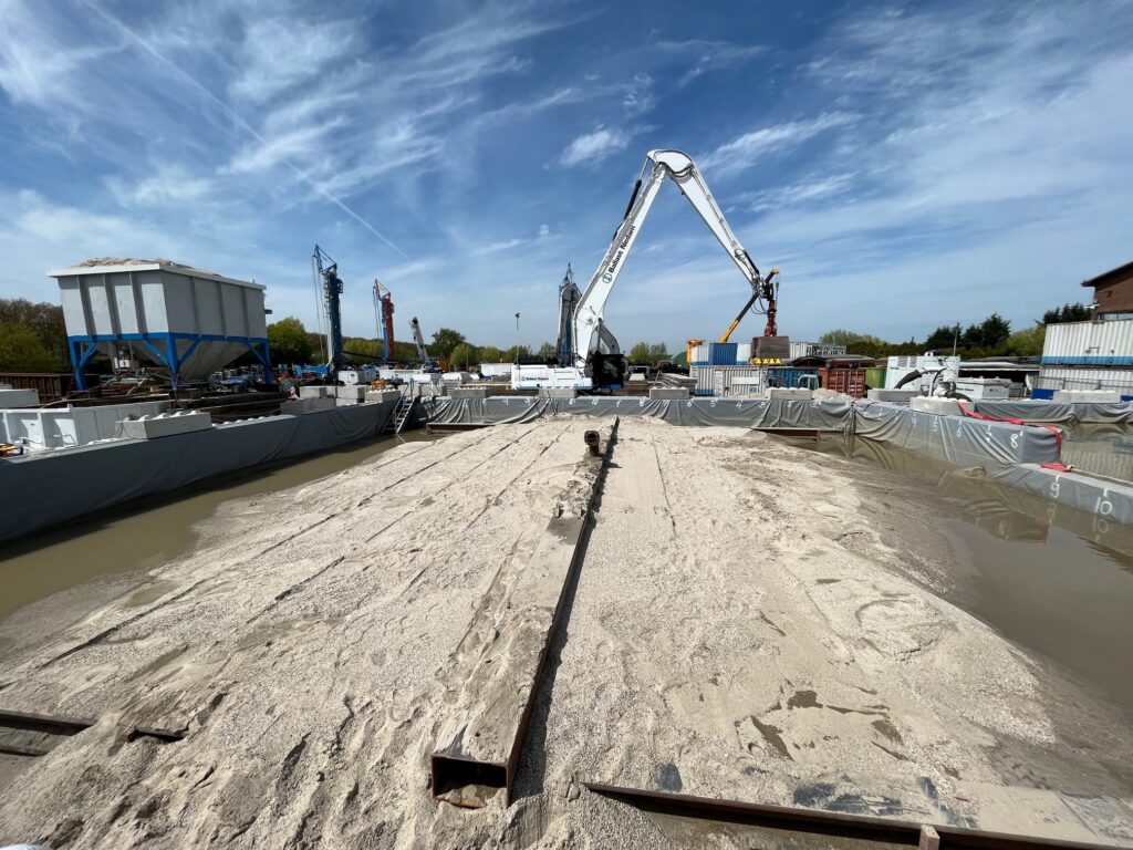 Unieke praktijkproef: onderstromen met heterogeen grof zand